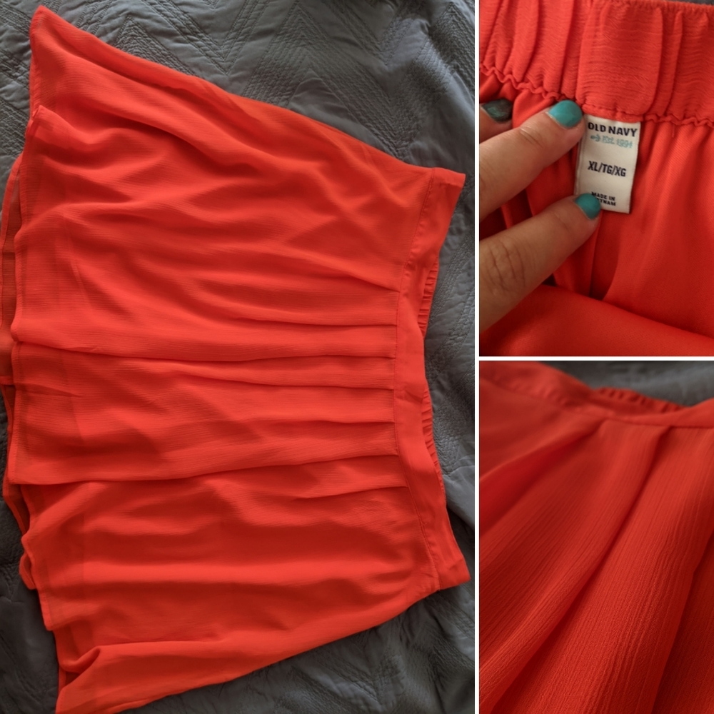Red pleated, flowy skirt